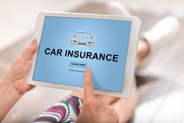 Car insurance concept on a tablet