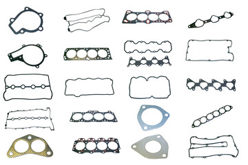 A large set of gaskets for the engine of a passenger car. Separated on a white background. Spare...