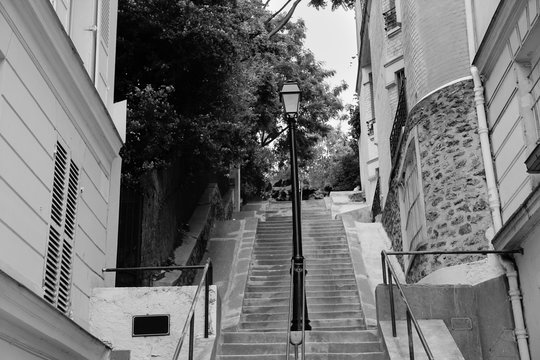 Fototapeta Montmartre stone stairs path in Paris, black and white