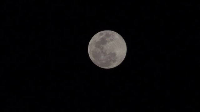 Time laps of moon movement on dark night