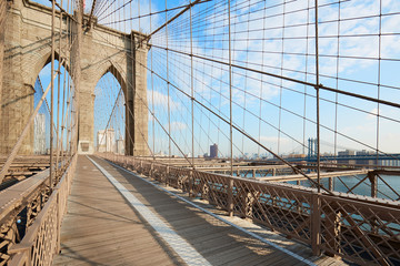 Empty Brooklyn Bridge footpath in a sunny day, New York