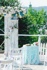Retro wedding ceremony outdoors. wedding arch. love sunny day