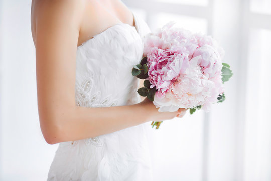 Bridal Bouquet Beautiful Of Pink Wedding Flowers In Hands Of The Bride