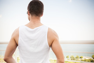 Back of  man in white shirt