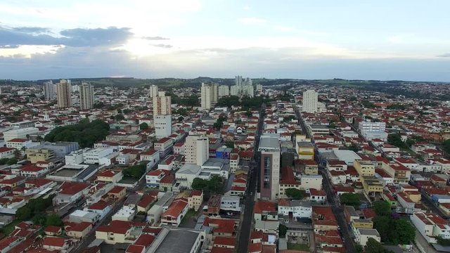 Aerial video about the city of Botucatu - São Paulo, Brazil - at sunset, until the arrival to Mother Church