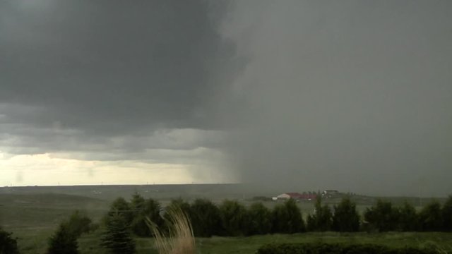Thunderstorm Wet Microburst Advances Across Farm