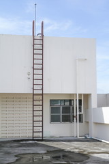 Staircase old vertical industrial metal rusted. to Water tank 