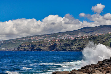 Waves hitting the coast of Tenerife island in Puerto de la Cruz, Spain