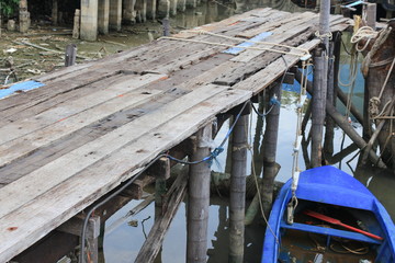 Wooden bridge and boat