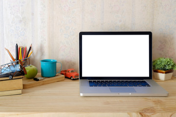Hero header. Laptop and gadgets on a wooden table background.
