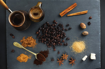 Coffee and spices on a dark background