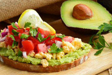 Avocado Toast with various vegetable. 
Clean food or clean eating  good for healthy.
The menu is made from avocado.