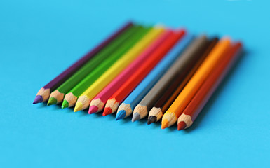 coloured pencil pastels on a colour background isolated