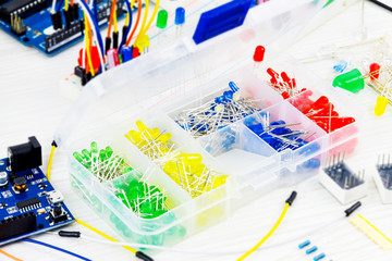 Colorful yellow, green, blue, red light-emitting diodes in transperent container with...