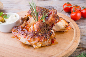Fried chicken on wooden board
