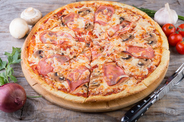 Whole baked pizza with bacon