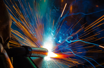 Industrial steel welder in factory technical, - obrazy, fototapety, plakaty