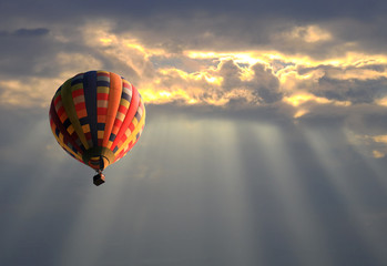 Hot air balloon in the sunset sky