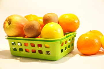 
Still life of ripe tangerine and other fruit isolated on white background
