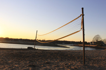 Beach Volleyball net at sunset