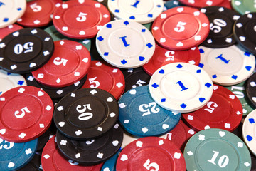 poker chips on casino table close up
