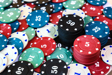 poker chips on casino table close up