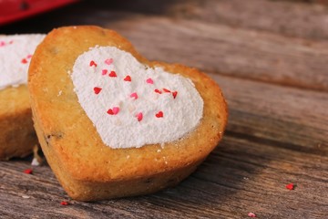 Homemade Two mini Heart cake with heart shape stencil work in the middle, selective focus