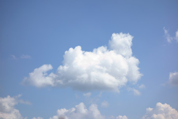 Naklejka na ściany i meble the white clouds floating on a background of blue sky