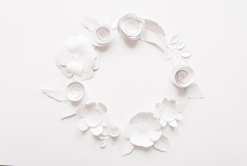 Round frame with white paper flowers