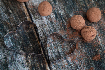 Truffle chocolate candies on cocoa powder