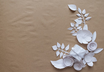 Paper flowers and white gift