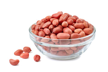 Peanuts in glass bowl on white