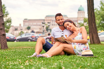 Young tourist couple in the grass