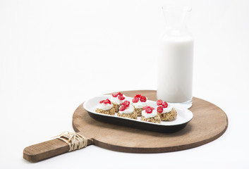Granola served with  milk