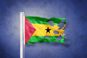Torn flag of Sao Tome and Principe against grunge background