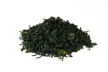 Dried japanese wakame seaweed isolated on white background
