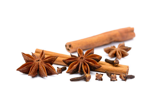 Aromatic star anise and cinnamon isolated on white background