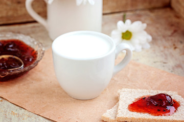 Milk and crispbread. Breakfast. Selective focus