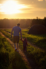 Dad with baby on nature
