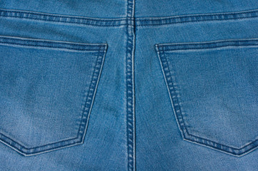 Jeans background of blue denim textile