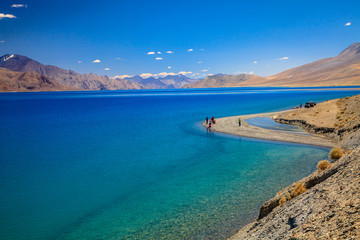 a beautiful mountain range naer pangong lake and a clearly sky
