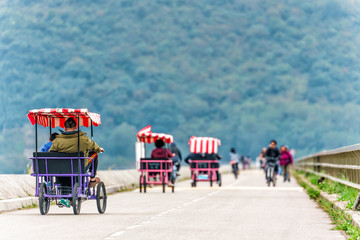 Plover Cove damb is a popular spot for outdoor leisure sports and activities with Chinese people who spend weekends and vacations riding bicycles in the open air