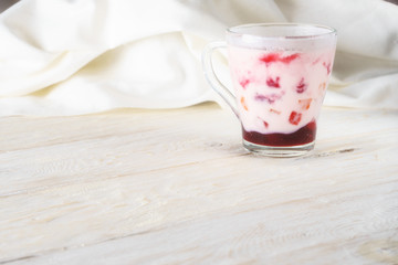 glassful smoothie with yogurt and jam