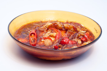fried eggs cooked with sauce