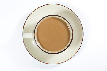 Isolated modern stylish white coffee cup or mug on a plate on a white background