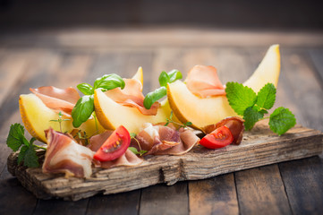 Melon with prosciutto and basil 