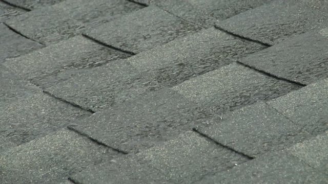 Rain Water Runoff on Asphalt Roof Shingles
