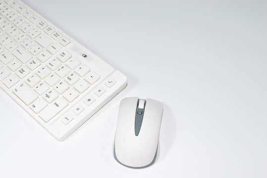 keyboard and mouse on white backround