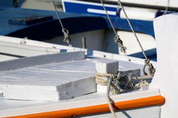 Nautical rope, detail on a small fishing boat. Selective focus. 
