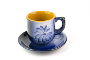 Beautiful blue cup with a pattern on a white background.